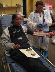 Production Manager donating blood