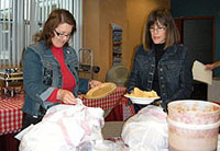 Volunteers serving dinner to Wounded Warriors at Balboa for Purple Heart Family Support an Outreach Program of Marine Parents